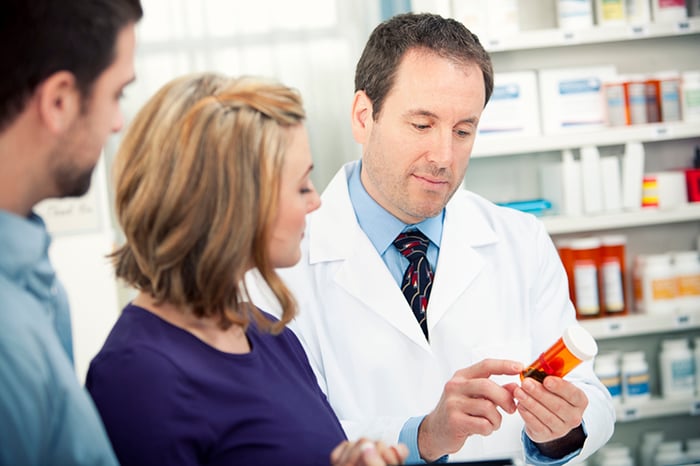Pharmacist consulting with patient-2