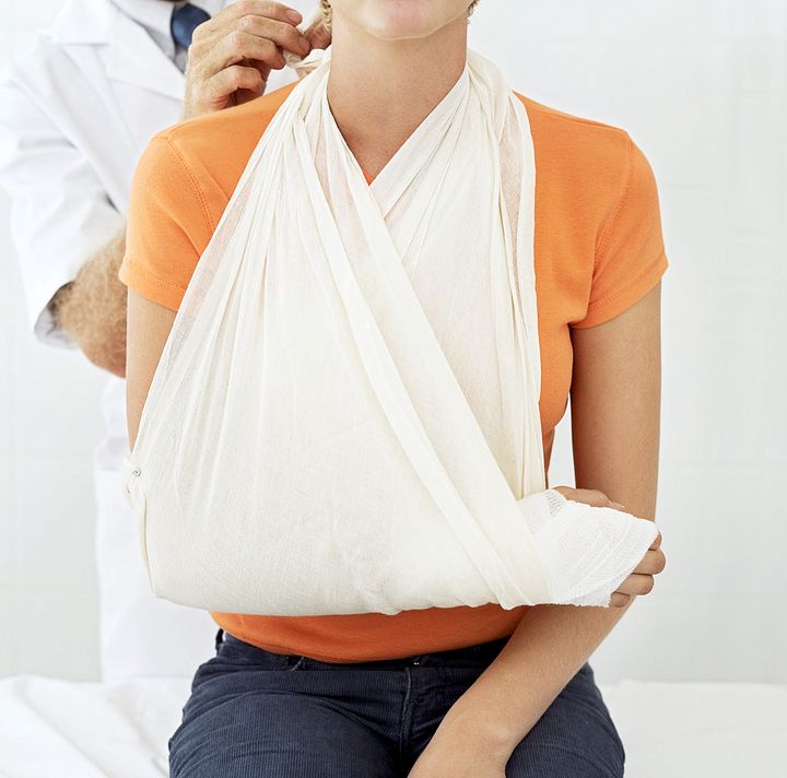 Injured woman at doctor 